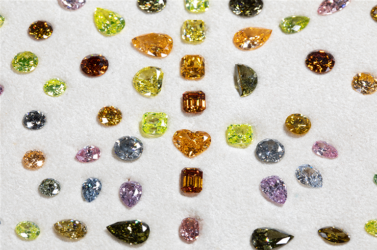 An assortment of diamonds close up.