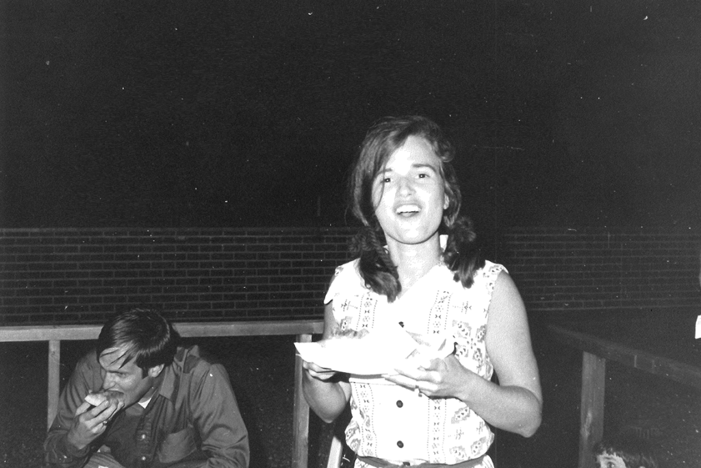 Dr. Carolyn Sumners in the 60s enjoying a meal.